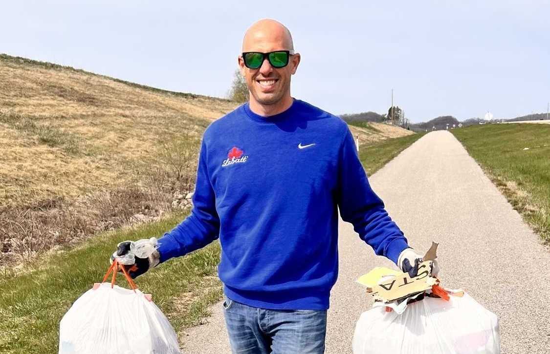 A FIFCO USA employee volunteering at an outdoor event