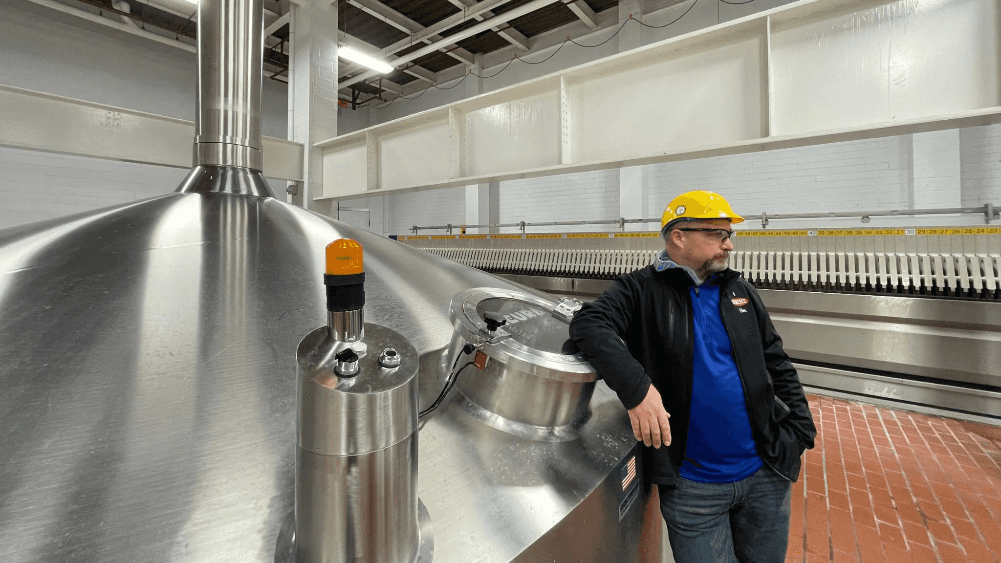 Emplyoee standing in the Brewhouse